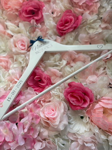 White wooden wedding hangers
