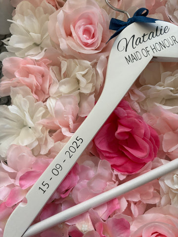 White wooden wedding hangers