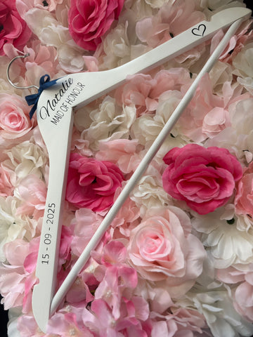 White wooden wedding hangers