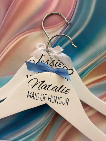 White wooden wedding hangers