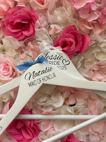 White wooden wedding hangers