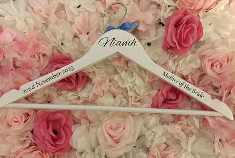 White wooden wedding hangers